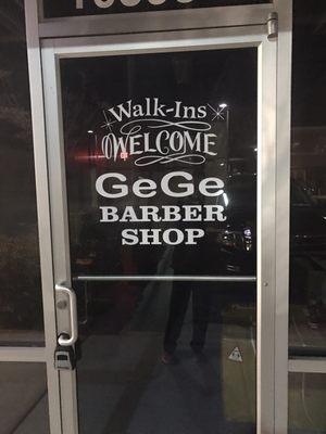 Front door of Ge Ge Barbershop ~