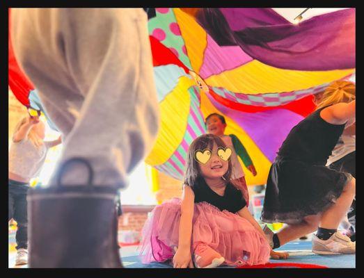 team building and bonding with parachute play