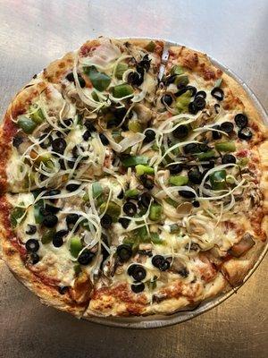 Onions mushrooms olives green peppers pizza