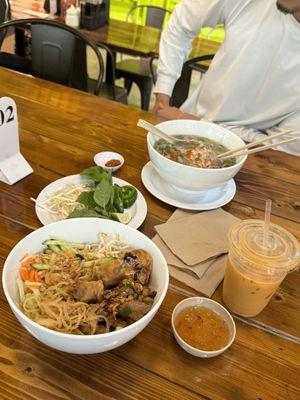 bun thit nuong dac biet and pho tai. with 16 oz. Dangki Thai Tea