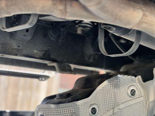 Safety recall work done at dealership and they forgot to tighten the gas tank. Tank fell while I was driving and could have killed me