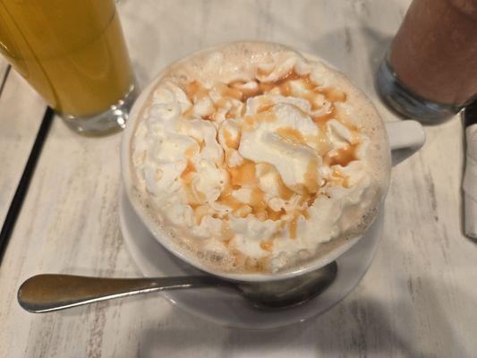 This is a caramel pecan macchiato I got it hot and added whipped cream. You can also get it iced.