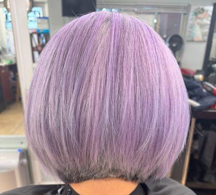 Hair cut bob style with a lavender kiss colored