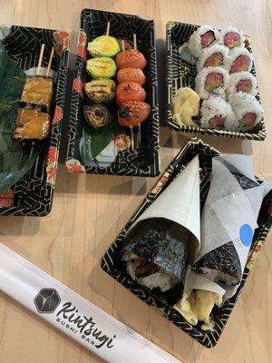 Eggplant skewer, brussel sprout skewer, grape tomato skewer, torotaku roll, spicy tuna handroll and unagi handroll