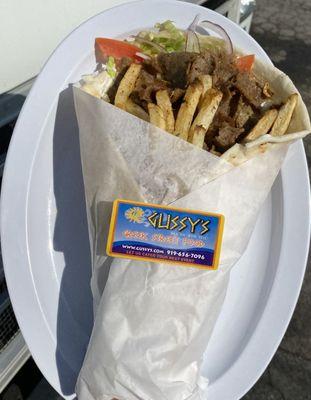 The Mega Gyro is The Biggest Gyro in The Carolinas. A Whopping 12 inch Pita stuffed with Gyro, Fries, Lettuce, Tomato, Onions and Tzatziki