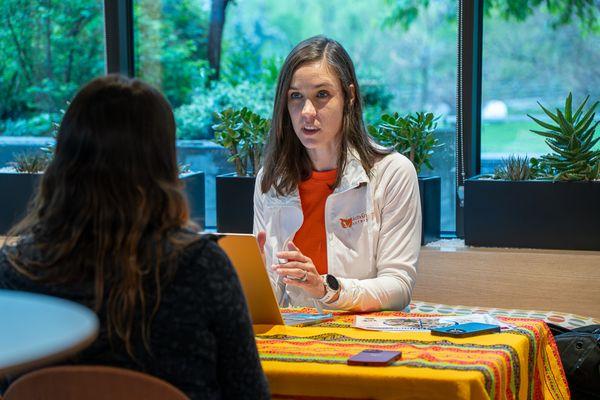 Emily working 1:1 with a client