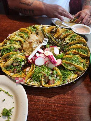 24 street tacos 12 brisket 12 asada.