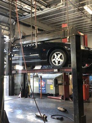 95 Del sol modifying the header down pipe to fit properly. Cat delete with straight pipe installed. Stock muffler.