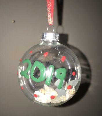 Medium size glass ornament with sea glass and shells. $9.95