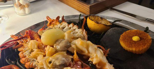 Split lobster and clams, butter, corn puree, potato
