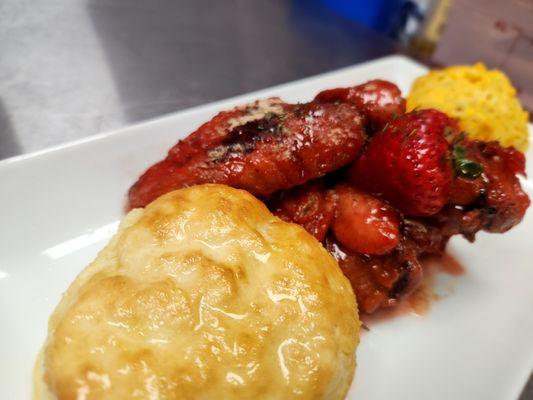 Sweet & Savory Strawberry Wings with mac and cheese and a biscuit.