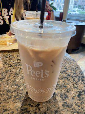Iced chai latte with oat milk