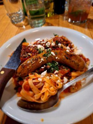 Putanesca w/ gluten-free fettuccine and Italian Sausage