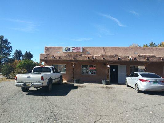 Between El Prado Liquor and Elevated Coffee Shop