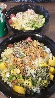 Small poke bowls. The one on the bottom has tuna and yellowtail, sushi rice and several add-ins.