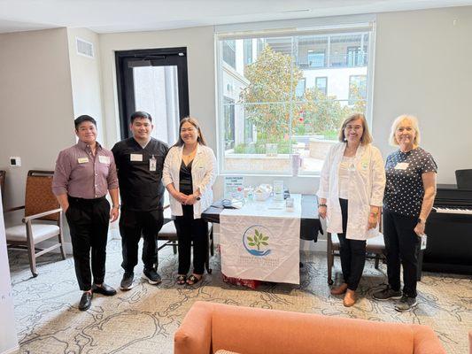 HPCC Team hosting a Blood Pressure Clinic with one of our partners