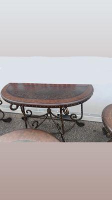 Table behind a couch