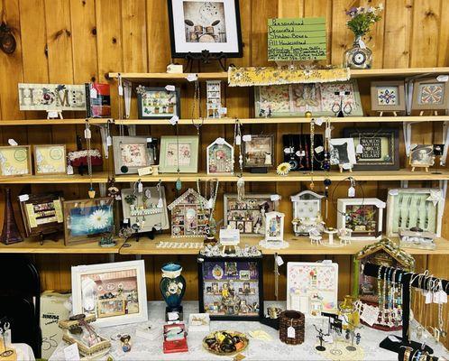 Handcrafted jewelry, handmade made home decor, and customized decorative handcrafted shadow boxes filled with handmade miniatures.