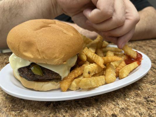 Mushroom Swiss burger with fries