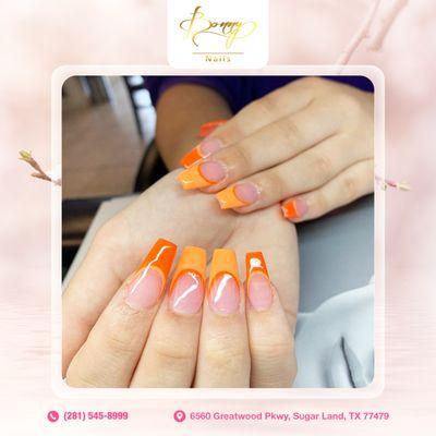 Who says French tips have to be basic? Add a twist with zesty orange tips for a fun, modern take on a classic look!