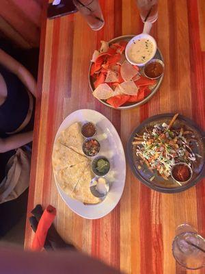 Quesadilla, brisket nachos, chips and queso