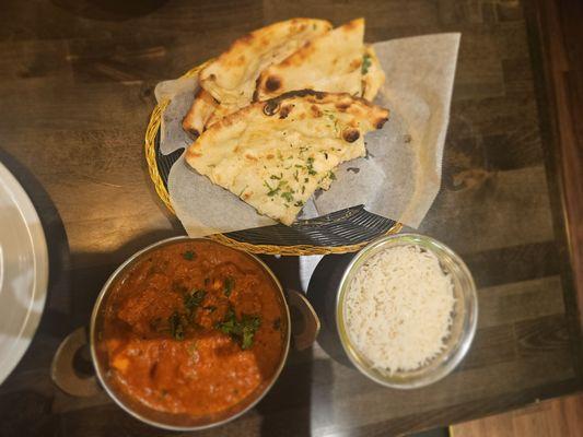 Mild butter chicken with Garlic Naan and rice.