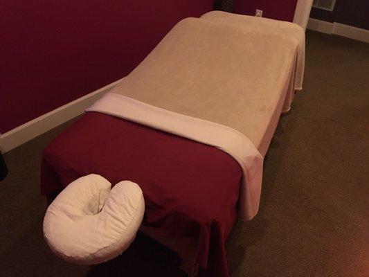 Cozy up on a warm massage table and let your troubles melt away