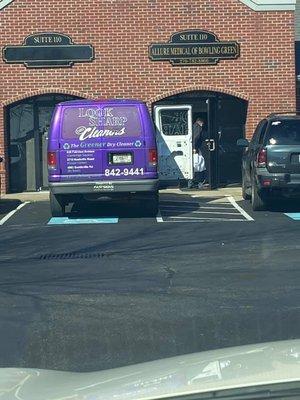 Picture of the Look Sharp van parked in the handicapped parking in front of a medical office.
