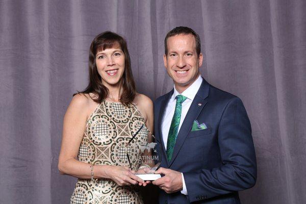 Andrea Cox with Adam Contos CEO of RE/MAX