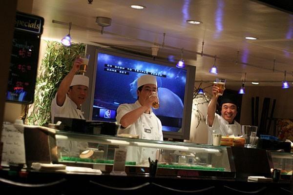the sushi chefs after we bought them beer