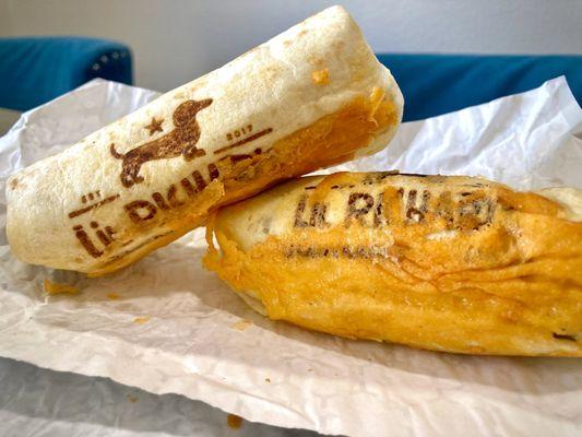 Two "Lil Richard" breakfast burritos, with toasted cheese and the cute wiener dog logo branded in.