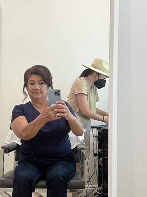 Front view of updo with Lela in background