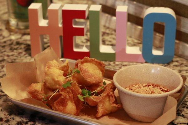 Kwek Kwek, 8 Fried quail eggs wraped with wonton skin served with sweet chili sauce and ground peanut