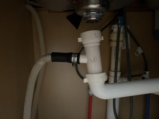 Piece that detached, flooding my cabinet. I also cannot use my dishwasher now.