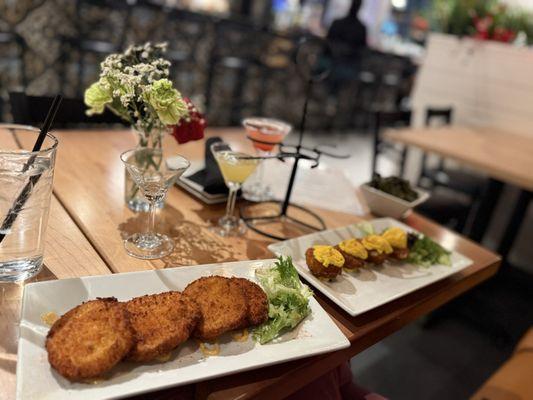 Fried green tomatoes (ask for more sauce but the tomatoes are CRISP!) and deep fried deviled eggs (because why not?!???)! 10/10