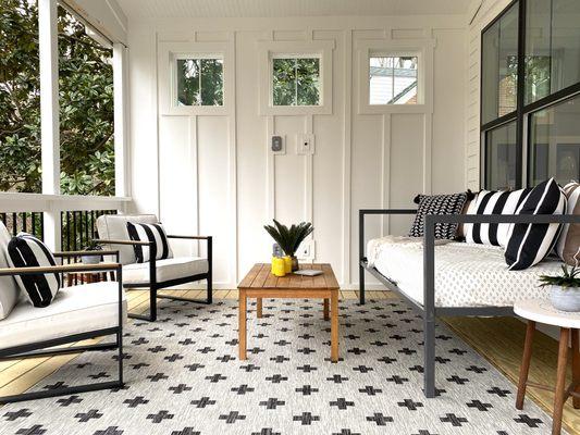 Screen deck, privacy wall with Board N Batten trim and multi media outlets