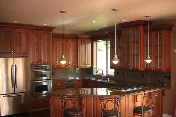kitchen cabinets and light fixtures + granite countertop