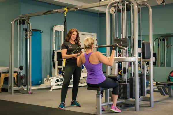 Helping clients reach their fitness goals.