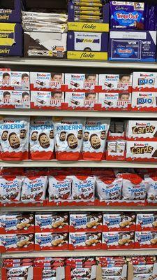 Grocery shelves neatly stocked with international and local favorites -- from sauces and canned goods to condiments and more!