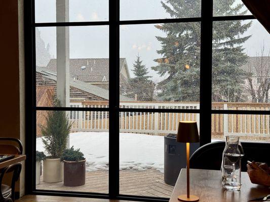 A tease of snow out the back window.