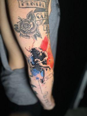 Black and gray with some color, image of an album cover