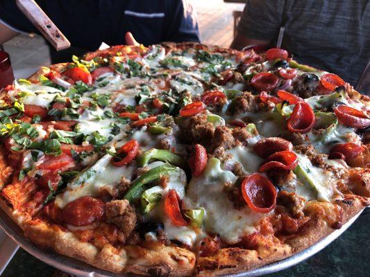 Large pizza. Half margarita, half everything