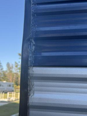 Notice the sloppy caulking job....