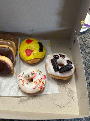 The yellow one comes out to roughly $5. The sprinkles on the white one are about as lame as you can get. And it taste plain and boring.
