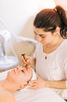 The Kansa Wand, an Ayurvedic massage tool calming inflammation.