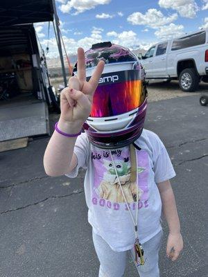 Josh letting my youngest try a kart for the first time