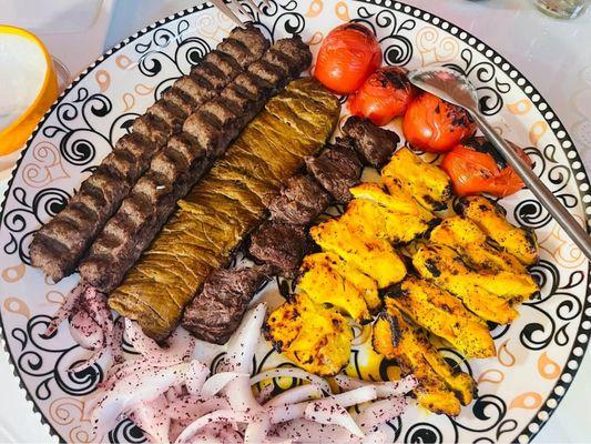 Family plate, filet mignion beef (Persian style barg) BBQ tomatoes with raw onion and sumac