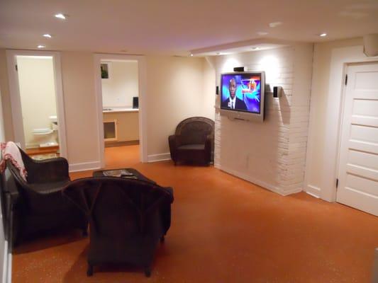 A damp, dark basement becomes a bright and dry new living space!