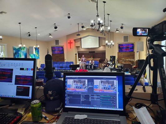 Caption of technology and inside of Evangelistic Missionary Baptist Church