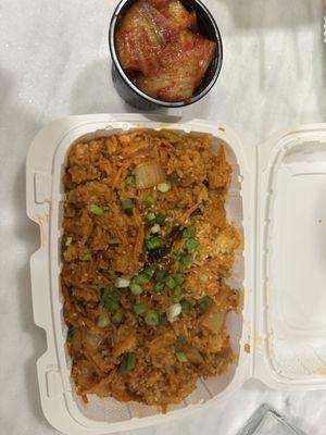 Kimchi fried rice with an extra side of kimchi. They make their kimchi themselves!